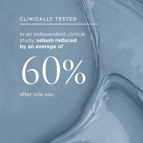 Clinical test results displayed over a smooth blue clay texture background, highlighting that Tropic’s New Horizons Blemish-Clearing Mask reduced sebum by an average of 60% after one use.