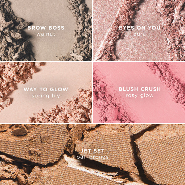 Close-up of five Tropic Colour Palette powder shades with names and textures: Brow Boss in walnut (taupe brown), Eyes On You in aura (shimmery rose), Way To Glow in spring lily (peachy highlight), Blush Crush in rosy glow (soft pink), and Jet Set in bali bronze (warm bronze).