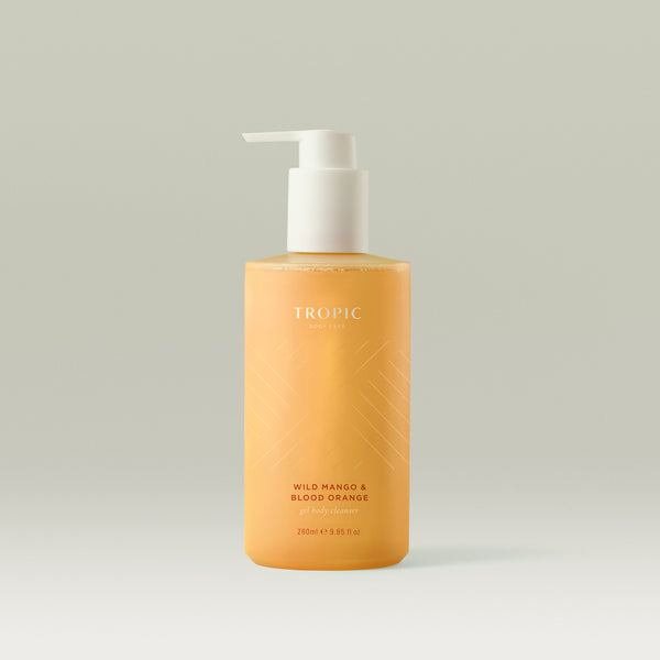 Tropic Wild Mango & Blood Orange Gel Body Cleanser in a frosted orange pump bottle.