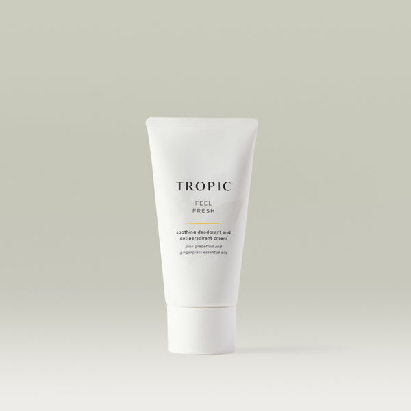 White Tropic tube labelled “Feel Fresh,” a soothing deodorant and antiperspirant cream with pink grapefruit and gingergrass essential oils, shown on a neutral background.