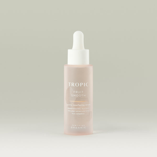 Fruit Smooth gentle resurfacing serum. The bottle is a pale pink with a white lid/pipette. Certified Organic. 