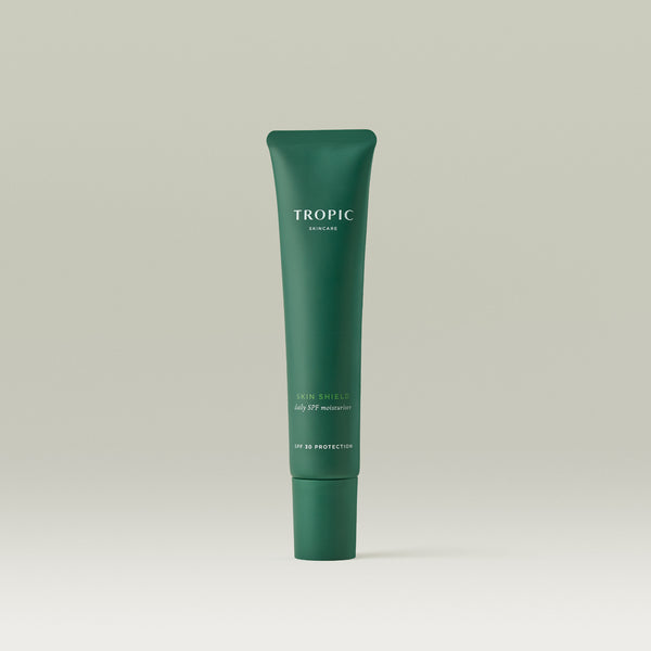 Tropic Skin Shield daily SPF moisturiser tube on neutral background.